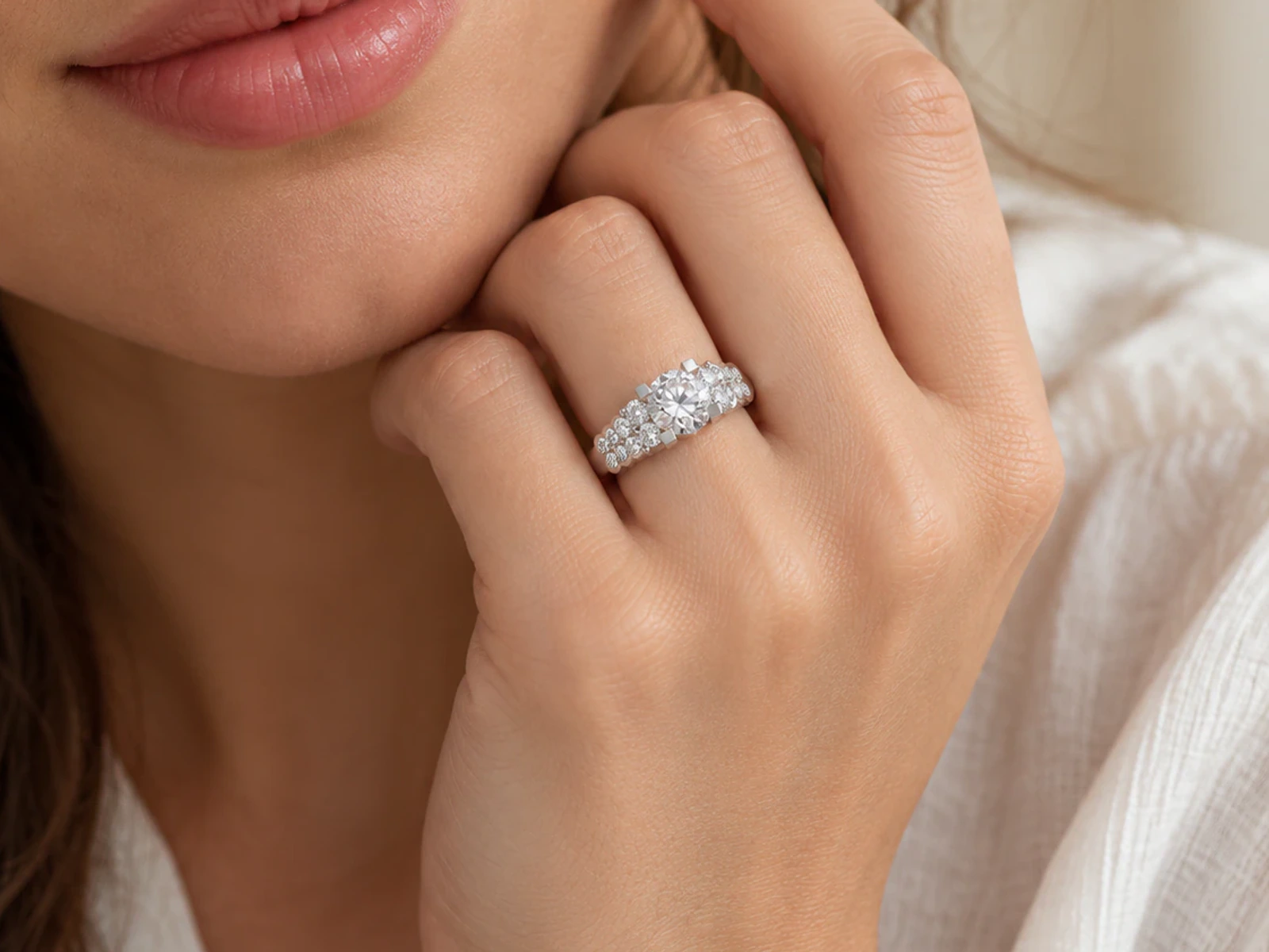 Round Center Triple-Row Pavé Ring in white gold, worn on a hand